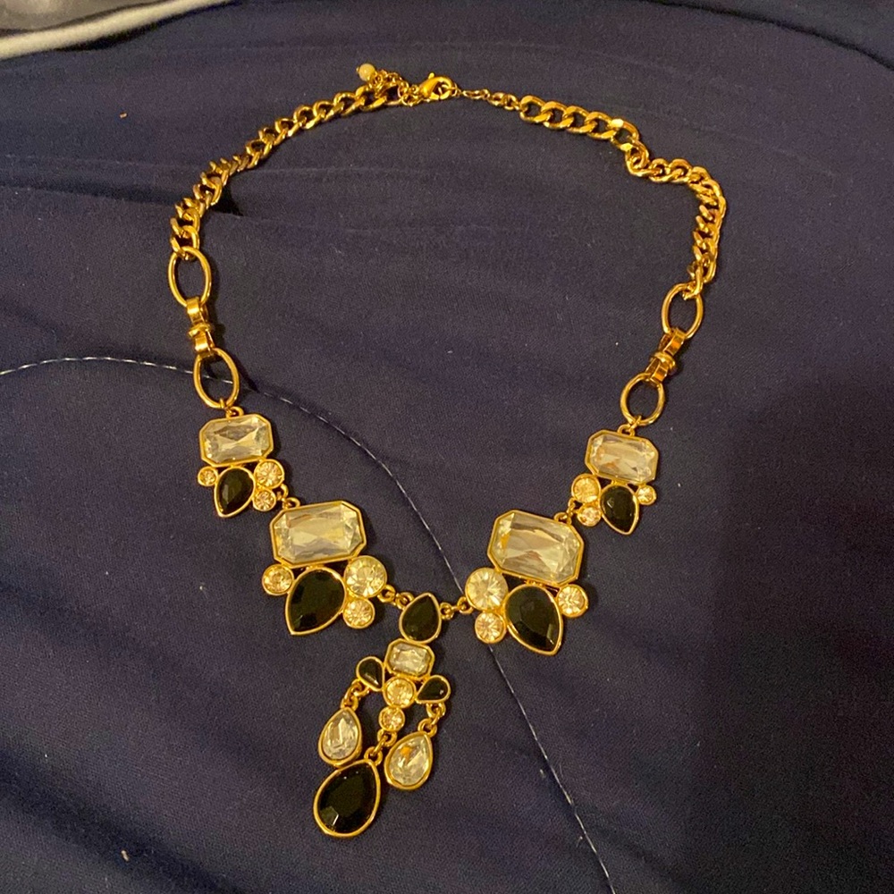 Rhinestones and black stones on gold chain statement necklace